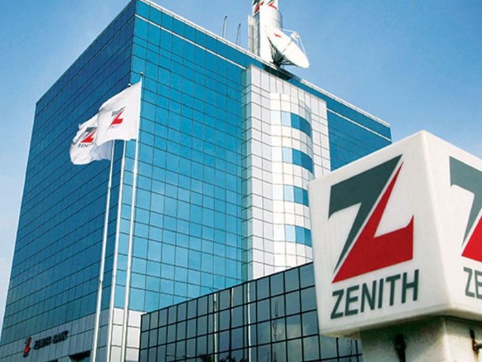 A modern bank building with the Zenith Bank logo prominently displayed.